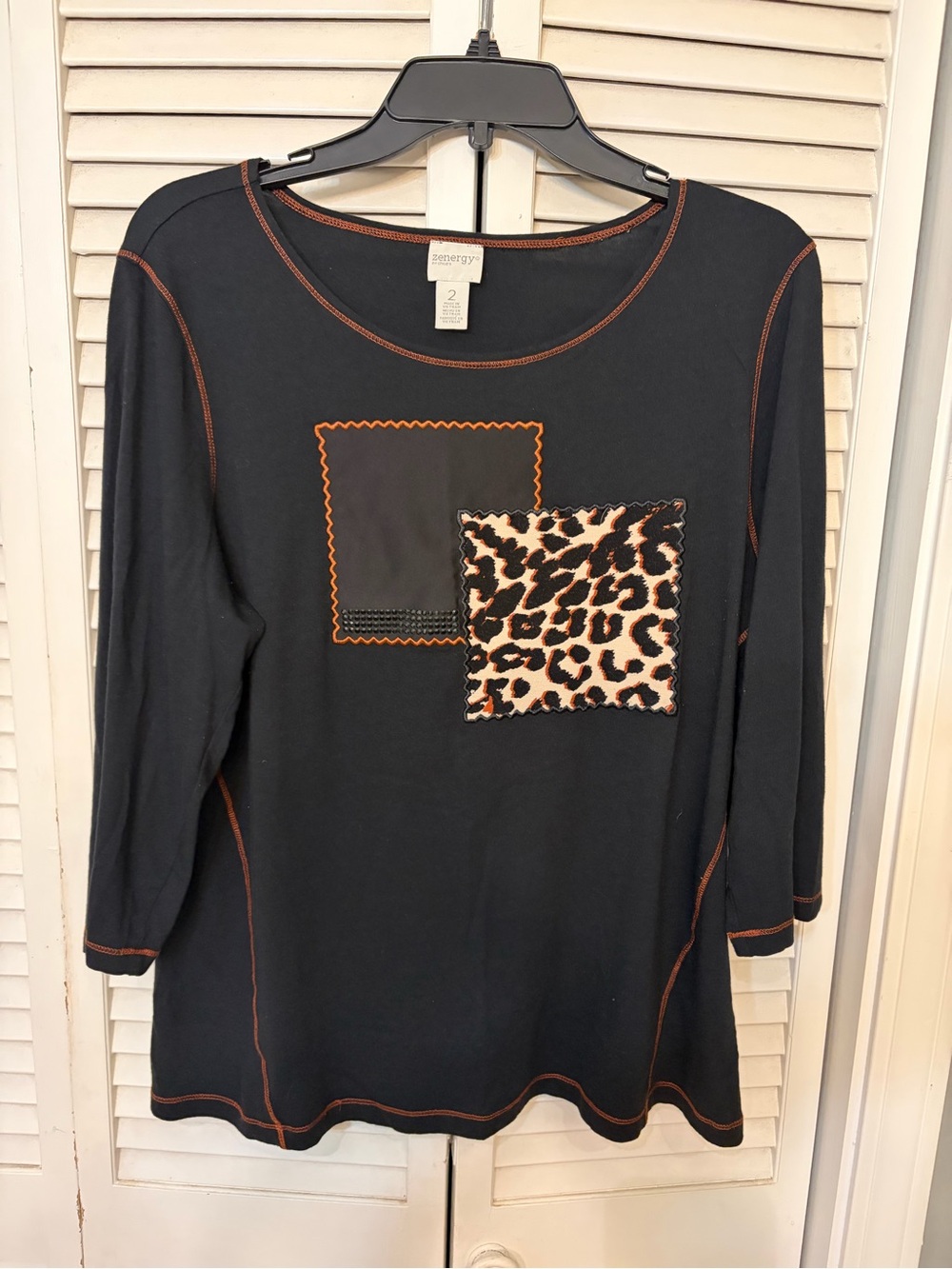 Chico's Black Long-Sleeve Top with Leopard Patch and Contrast Stitching